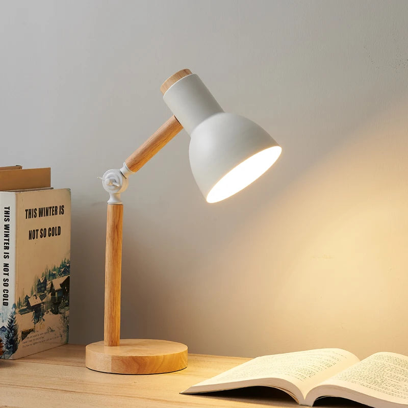 Aureline Nordic desk lamp in white with warm wood accents and an adjustable angled shade