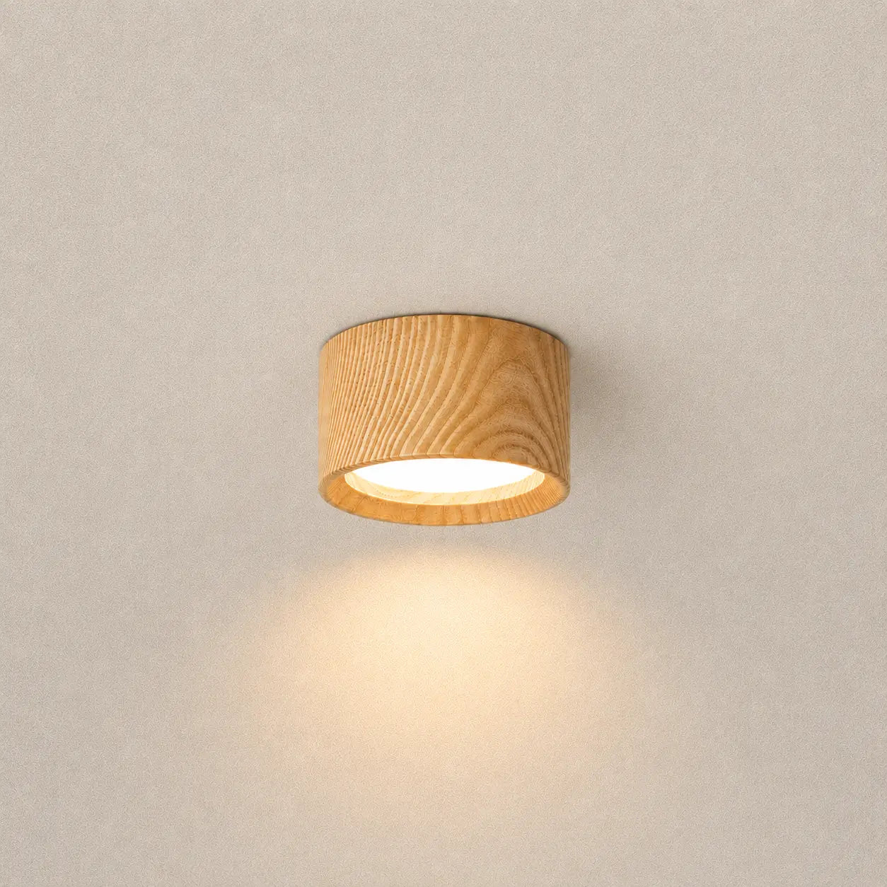 Auro wooden ceiling light with a round wood-finish shade and soft warm downward glow