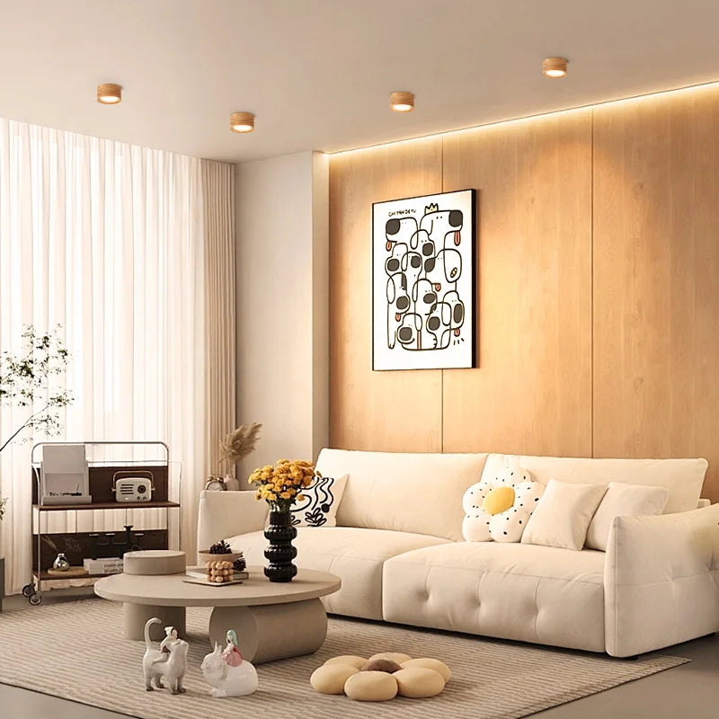 Auro wooden ceiling light adding warm low-profile illumination to a calm living room