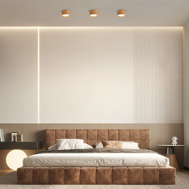 Auro wooden ceiling lights creating soft overhead lighting in a bright open-plan room