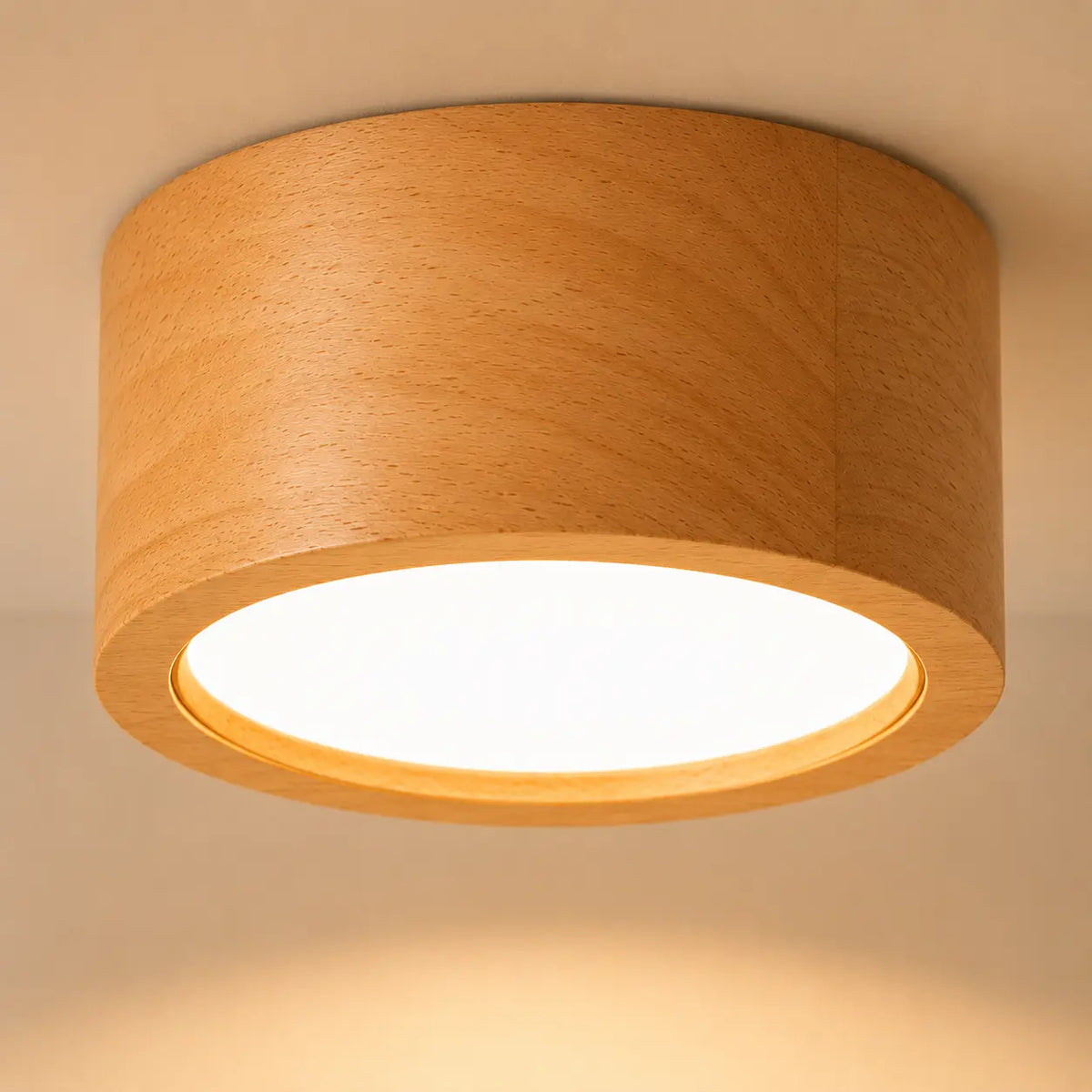 Auro wooden ceiling light with a round wood-finish frame and warm diffused light