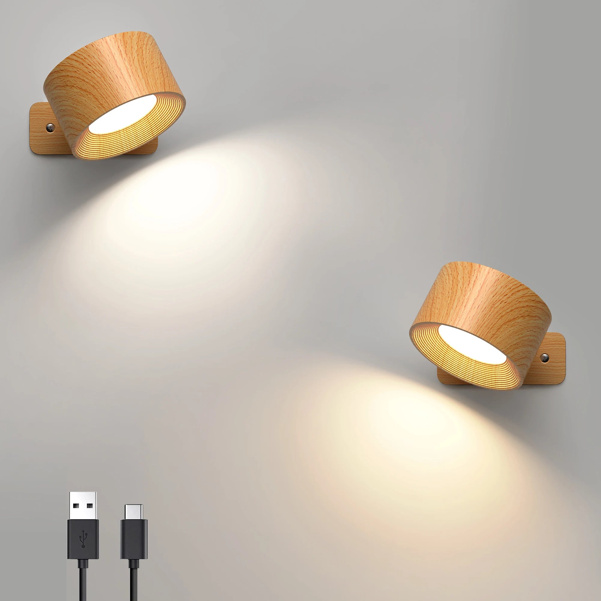 Avelis rotatable wall lights creating soft adjustable glow on a neutral wall