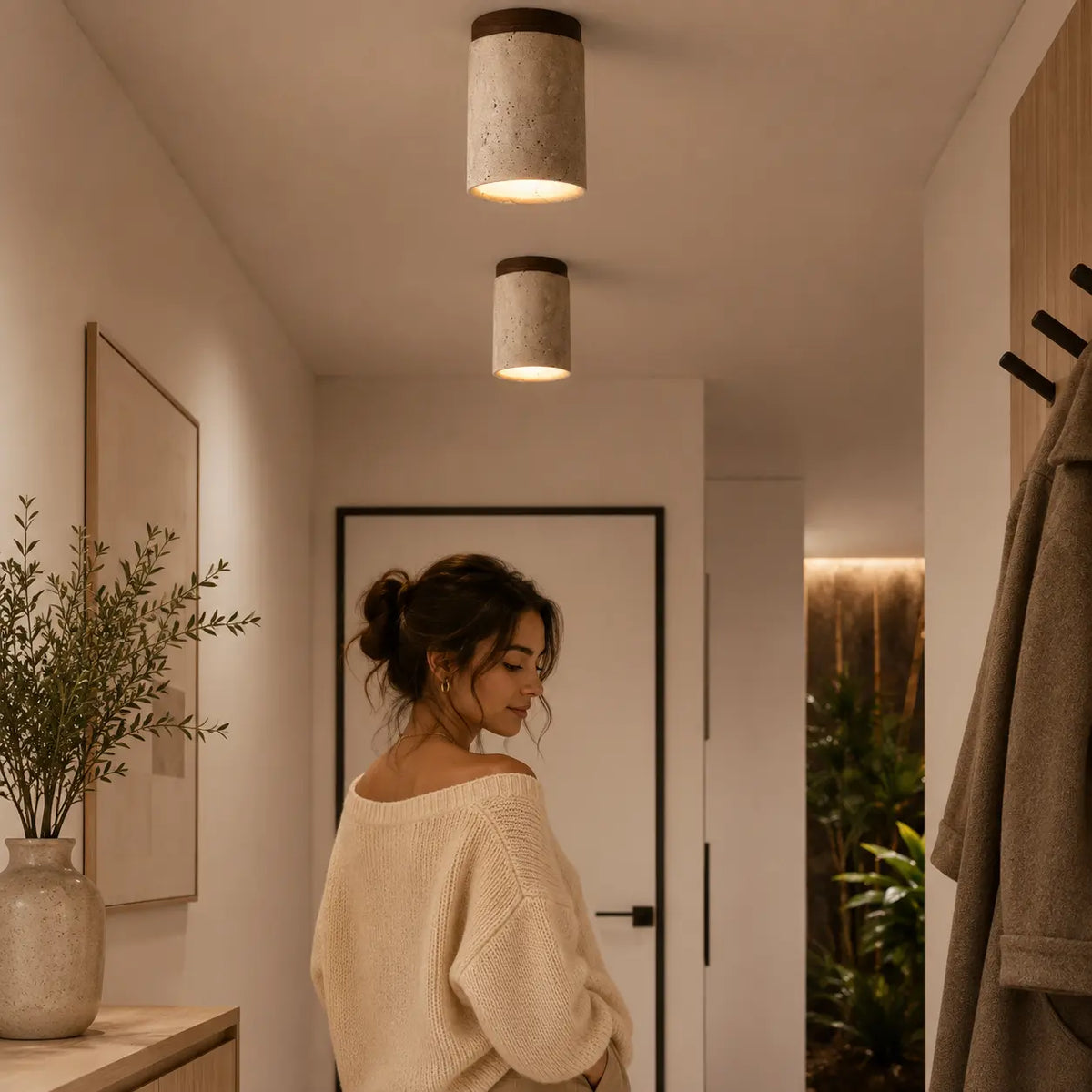 Aven stone ceiling light installed above a neutral hallway with soft warm downward light