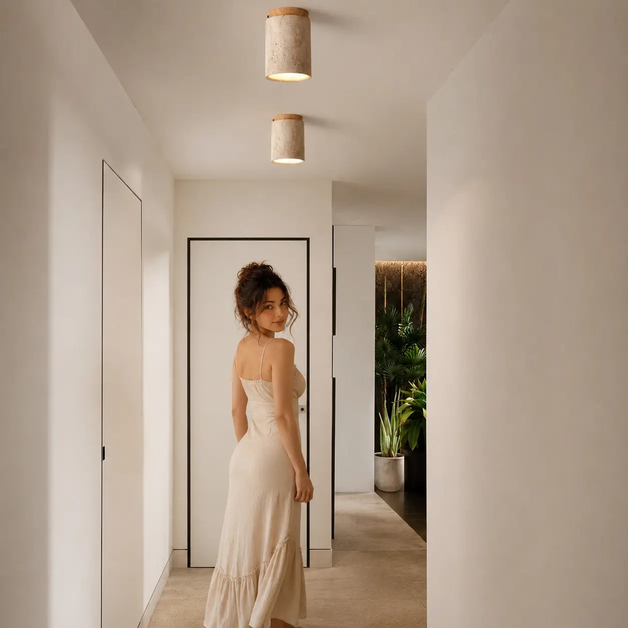 Aven stone ceiling light creating soft warm overhead light in a calm hallway