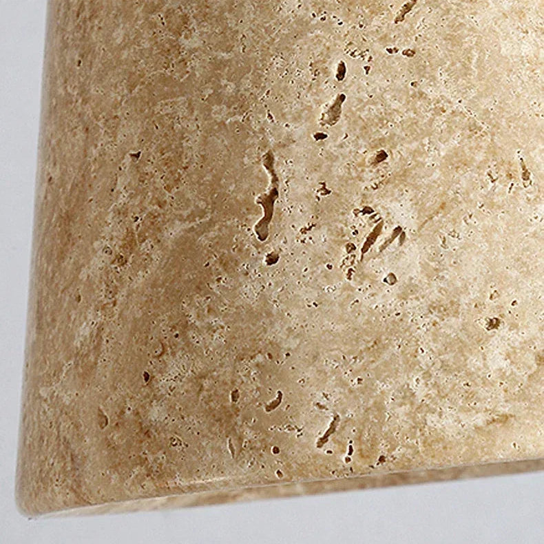 Close-up of the textured shade finish on the Cael wood wall light