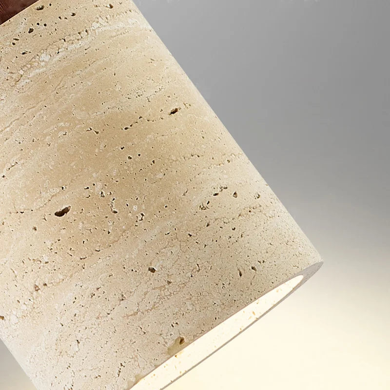 Close-up of the textured stone shade on the Ciela pendant light