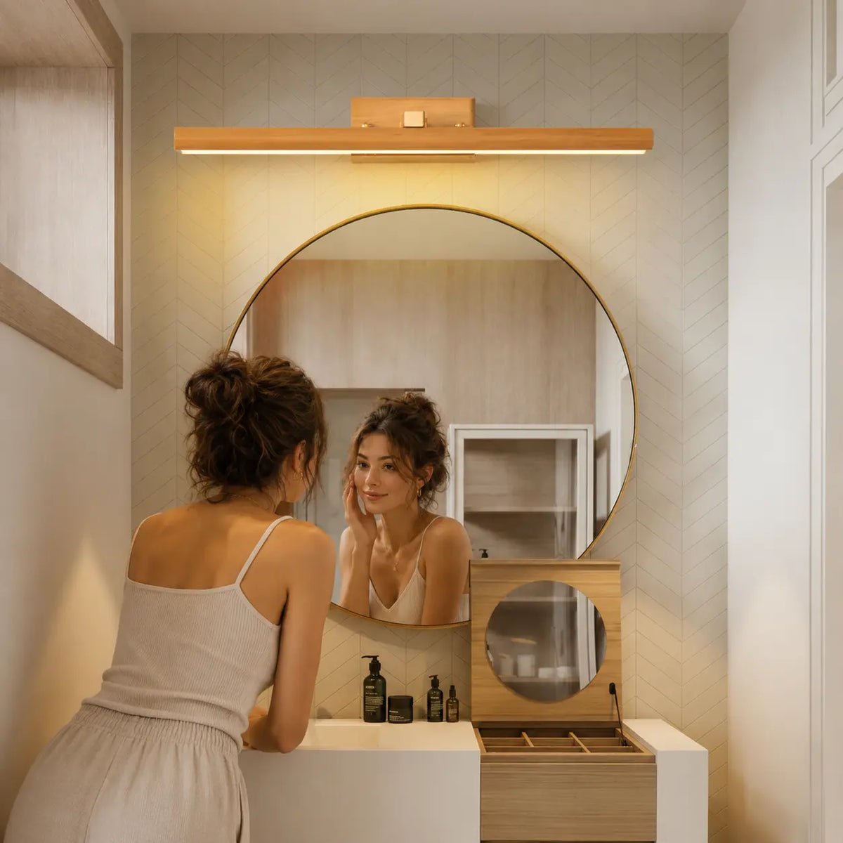 Glow magnetic wall light adding warm ambient light above a bathroom vanity mirror