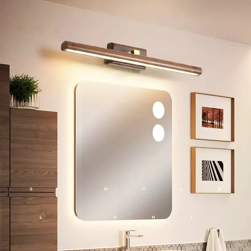 Glow magnetic wall light installed above a mirror with warm adjustable lighting