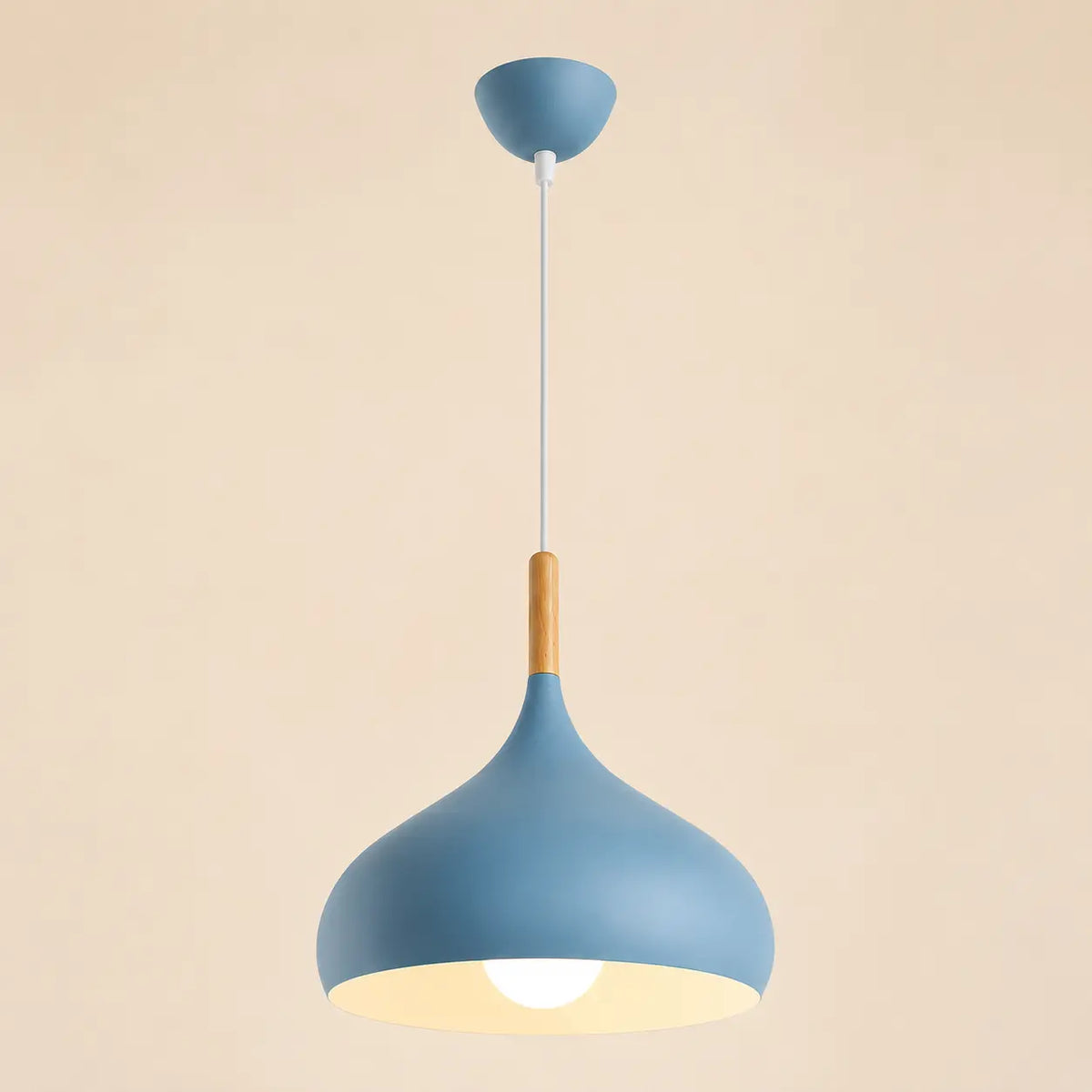 Lunara Nordic pendant light in blue with a slim hanging cord and soft warm glow
