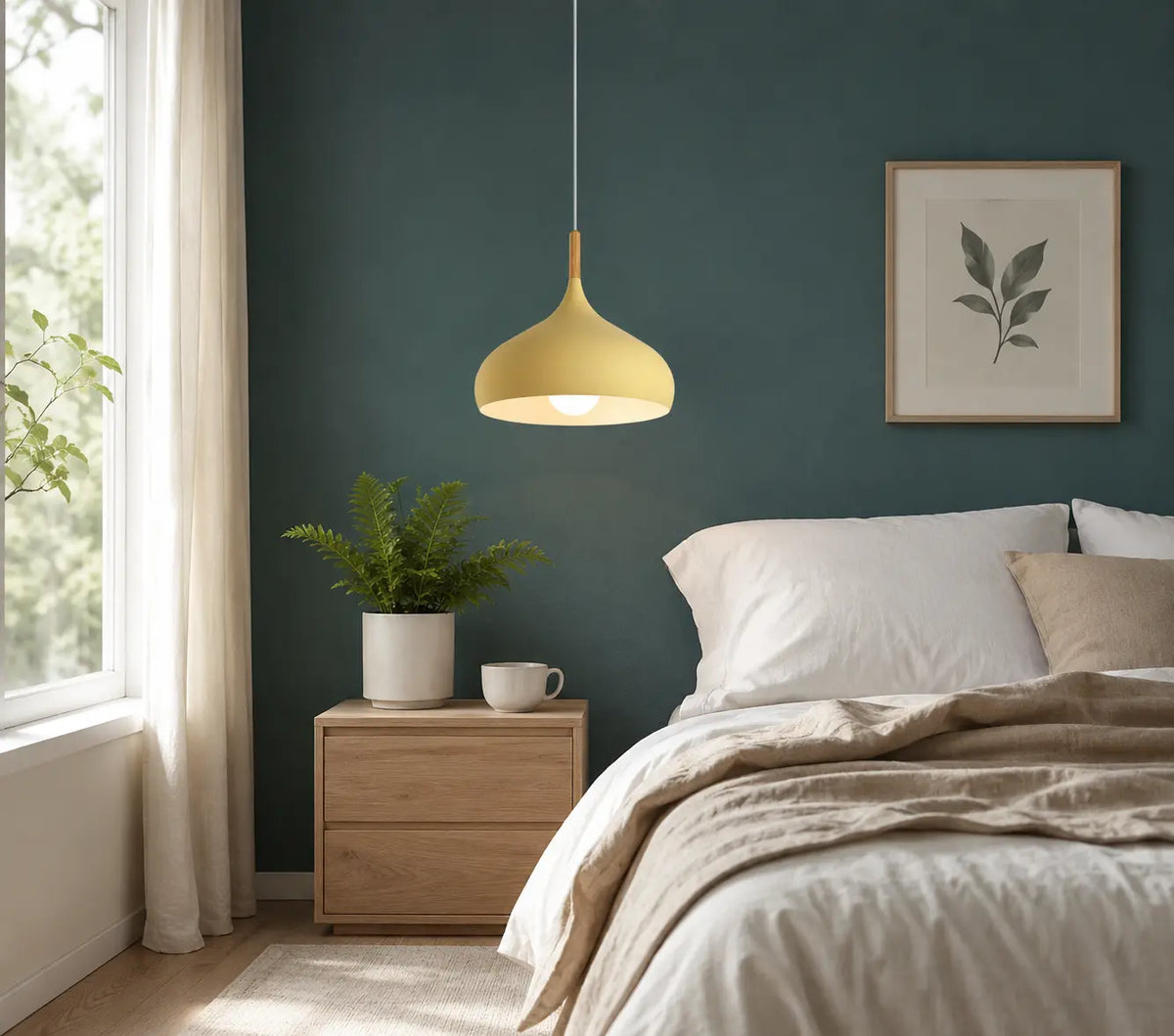 Lunara Nordic pendant light in green adding soft warm light to a modern bedroom