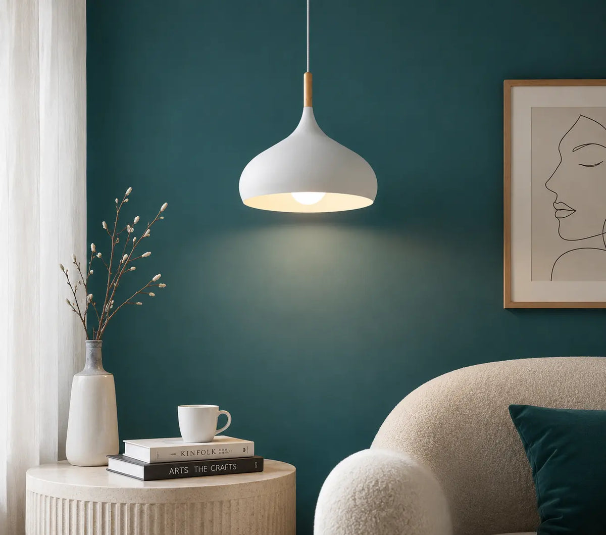 Lunara Nordic pendant light in white creating soft ambient light in a calm bedroom