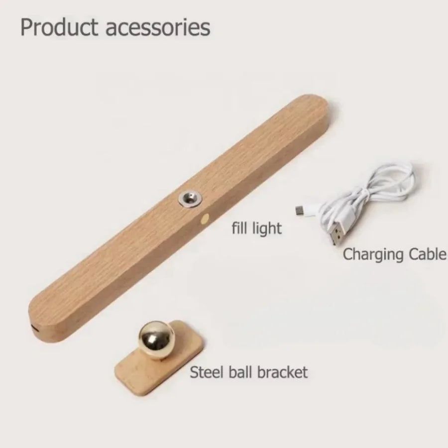 Lunor magnetic wall light accessories display with wood light bar, wall bracket, and charging cable