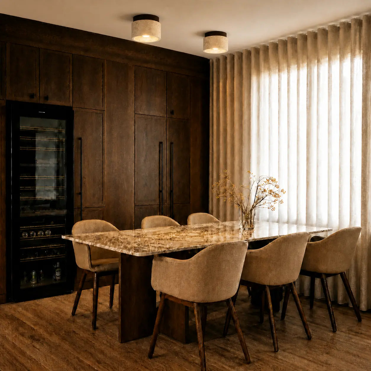 Mira stone ceiling light creating a quiet warm atmosphere above a dining table