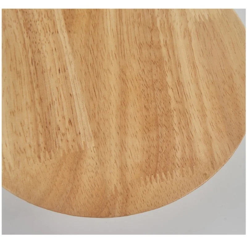 Close-up of the wood grain finish on the Orvane wooden wall light