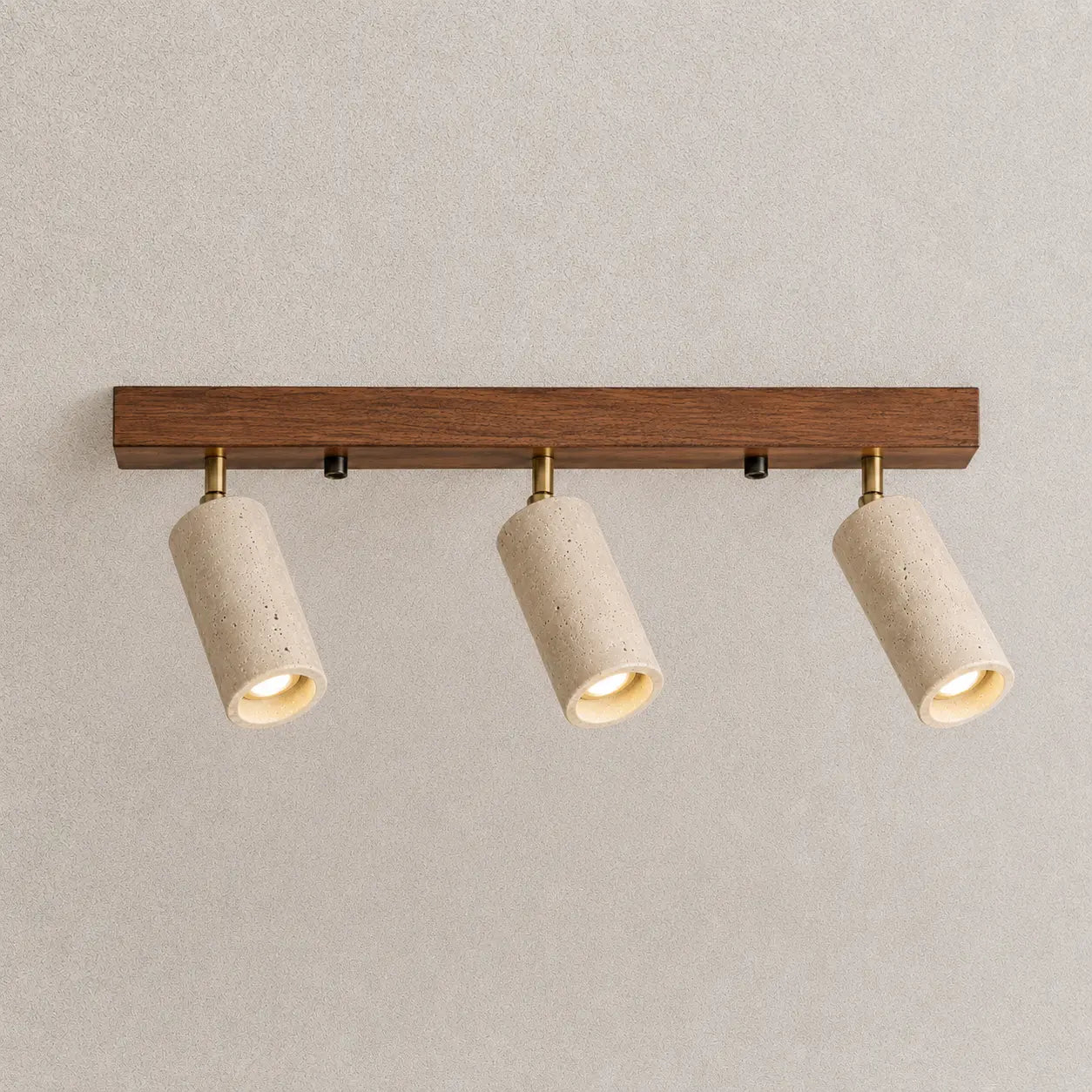 Rhea stone ceiling light with three adjustable stone-finish spotlights and a warm wood mounting bar