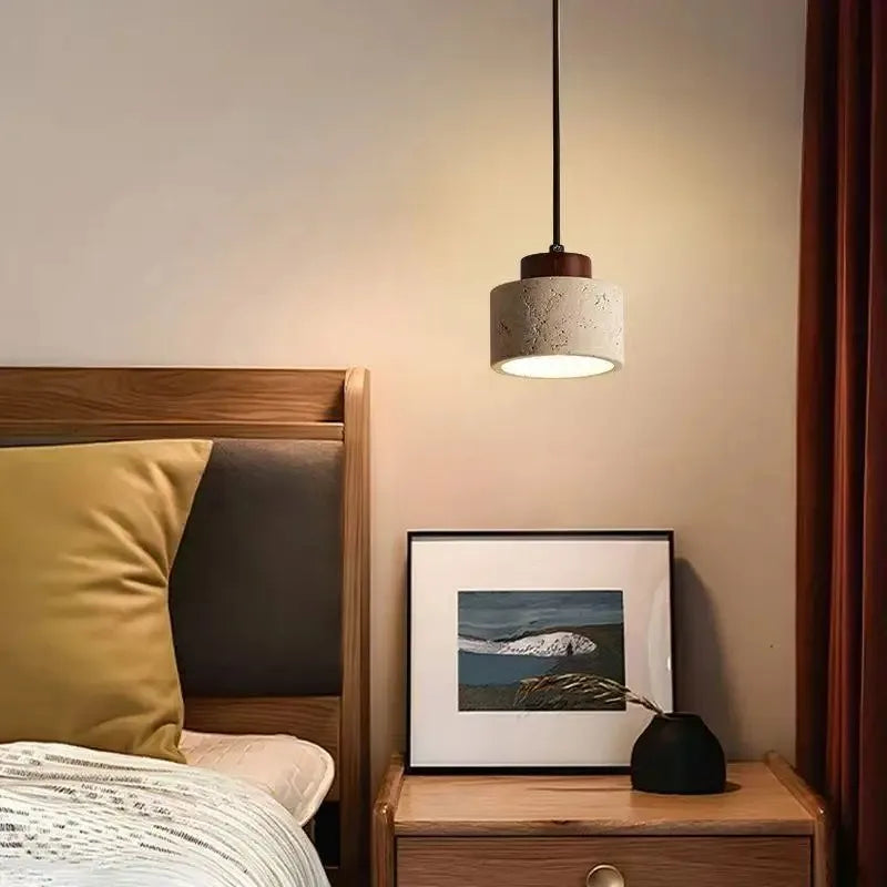 Selo stone pendant light installed beside a bed with soft warm downward lighting
florona-selo-stone-pendant-light-bedroom-decor-11