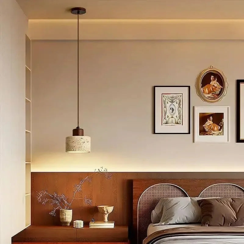 Selo stone pendant light creating a soft warm accent in a bright neutral living room