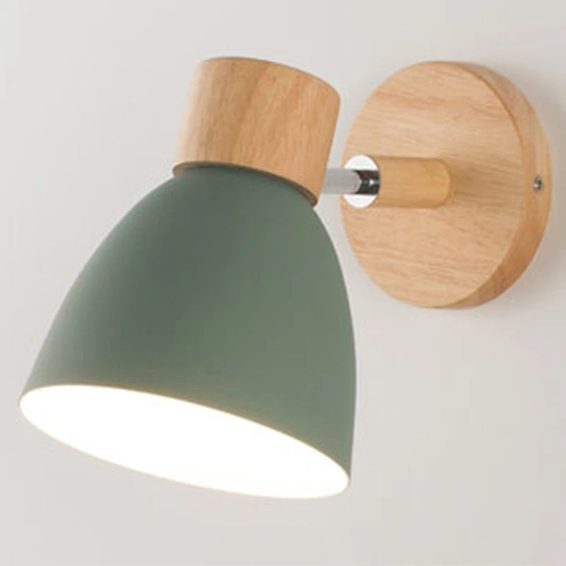Solenne macaron wall sconce in green with adjustable shade and natural wood wall mount