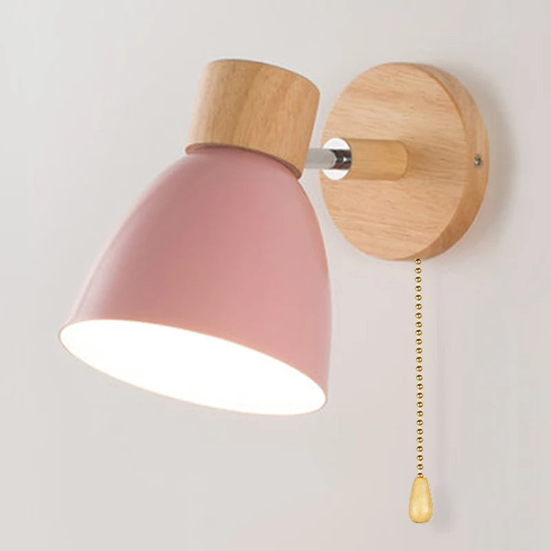 Solenne macaron wall sconce pink color option with natural wood mount and pull cord