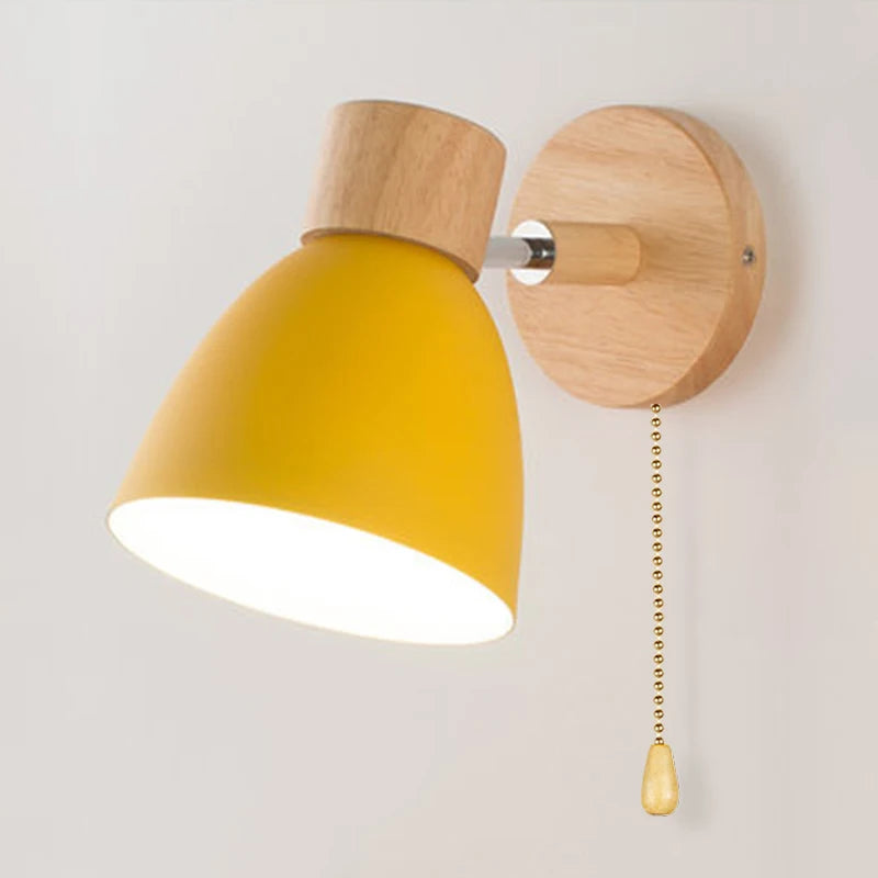 Solenne macaron wall sconce yellow color option with natural wood mount and pull cord