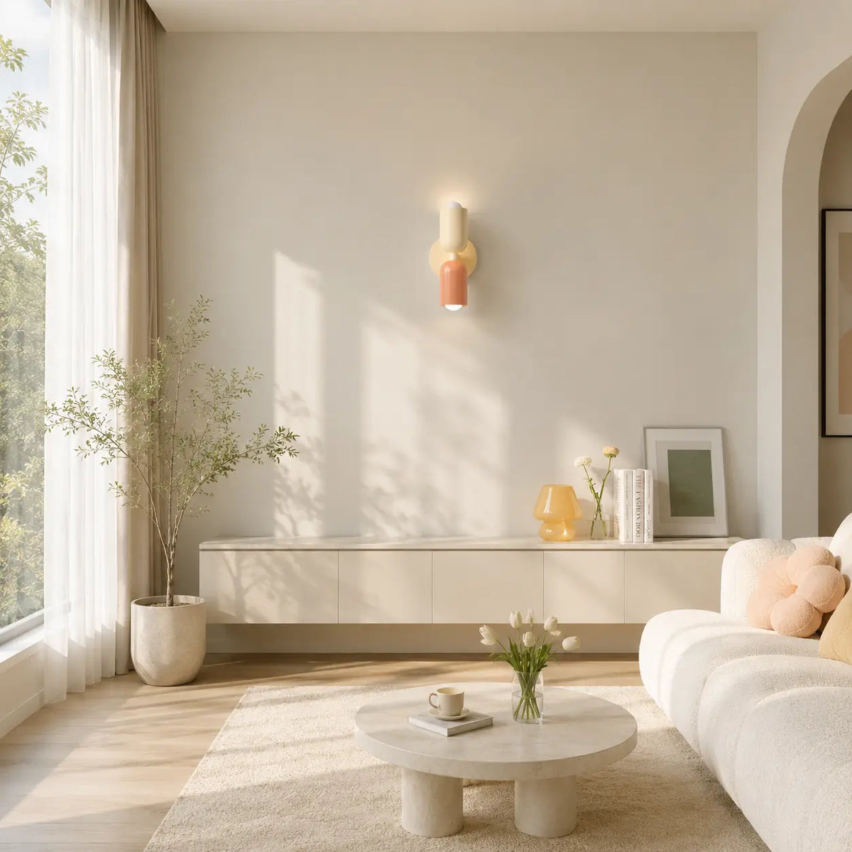 Solvi macaron wall lights creating a playful warm atmosphere in a neutral living room interior