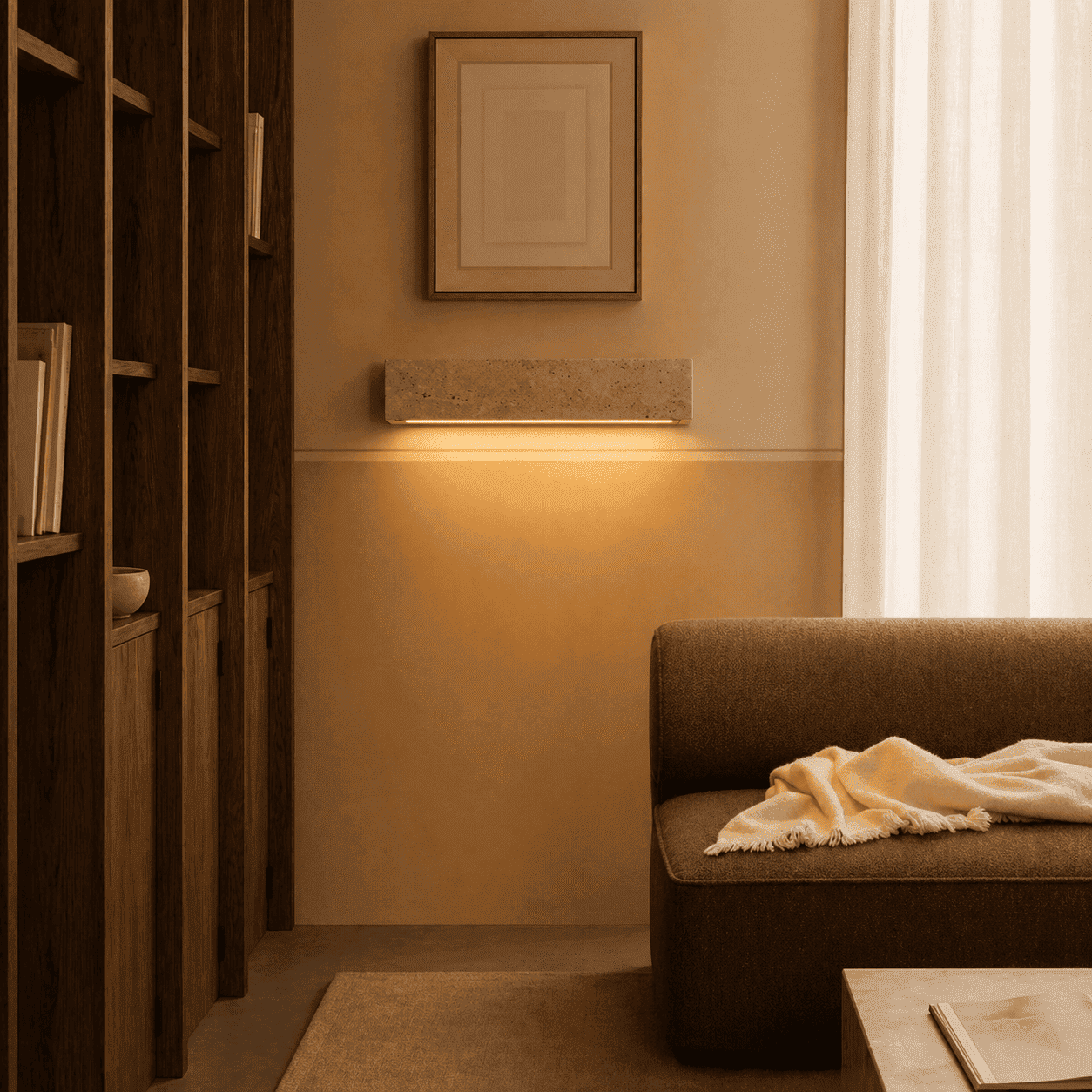 Tarin stone wall light creating a soft warm accent in a quiet hallway interior