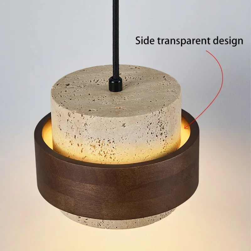 Close-up of the Tova stone pendant light with wood accent, textured stone shade, and hanging cord detail