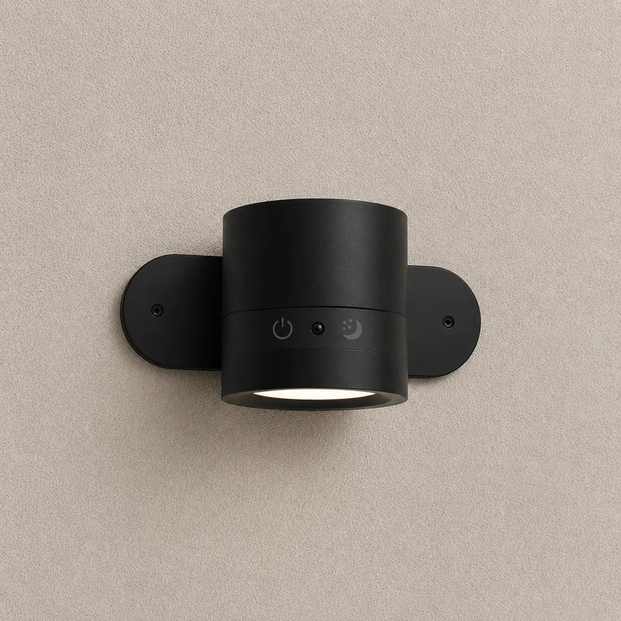 Veyra magnetic wall light with a black double-head design and soft warm directional glow